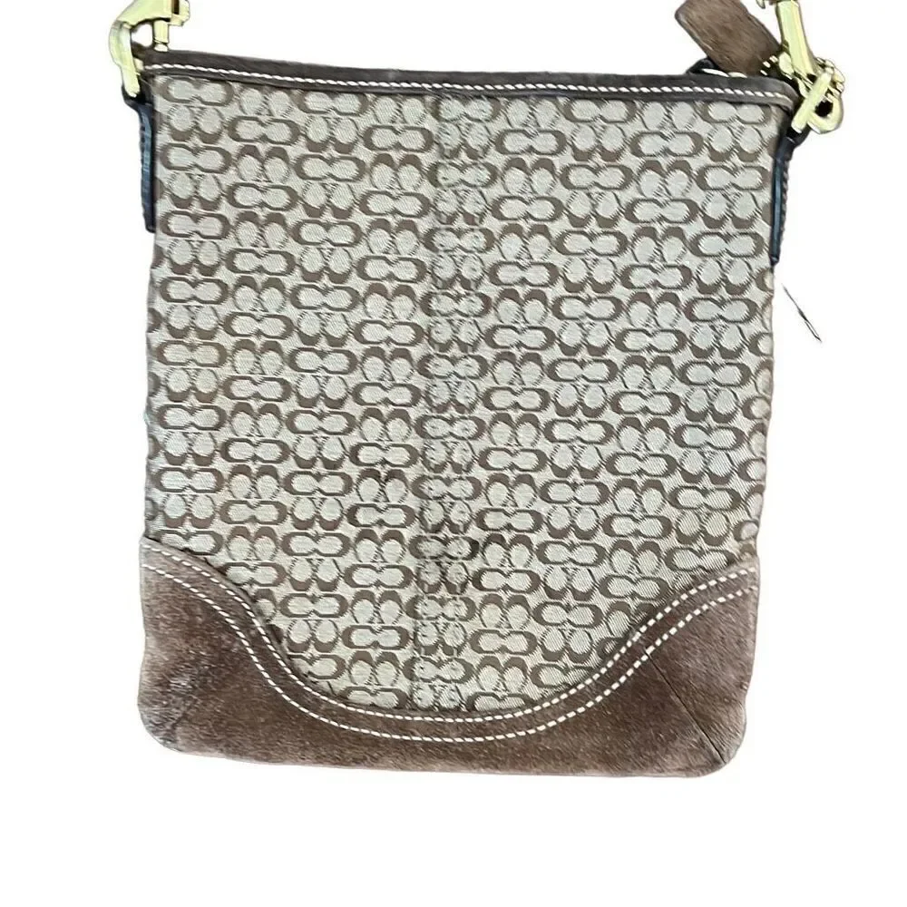 ￼ Coach, Crossbody mini bag with suede bottom